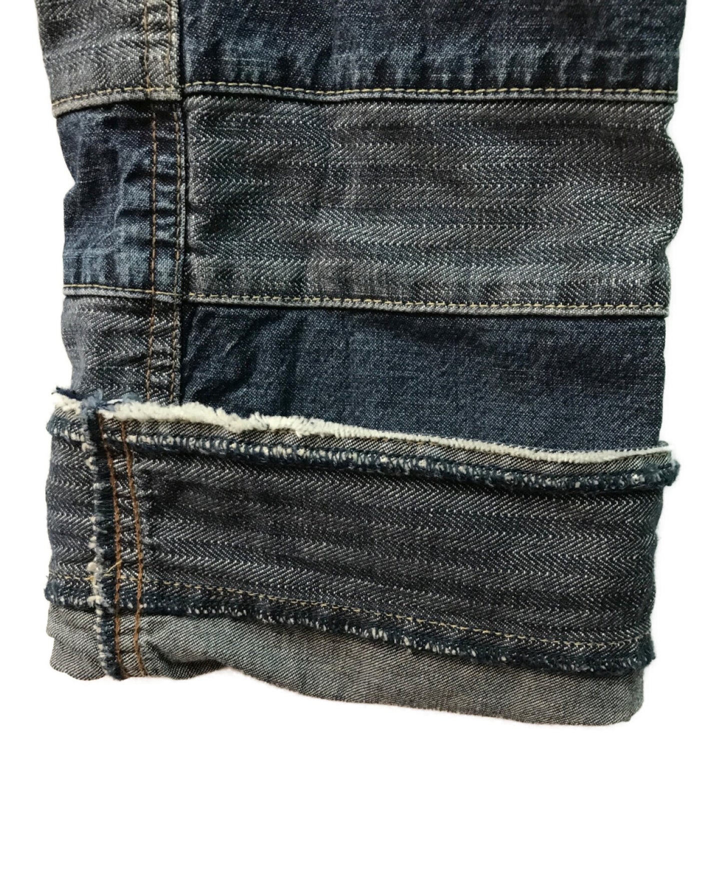 歇斯底里的魅力刮擦牛仔布裤修补牛仔裤