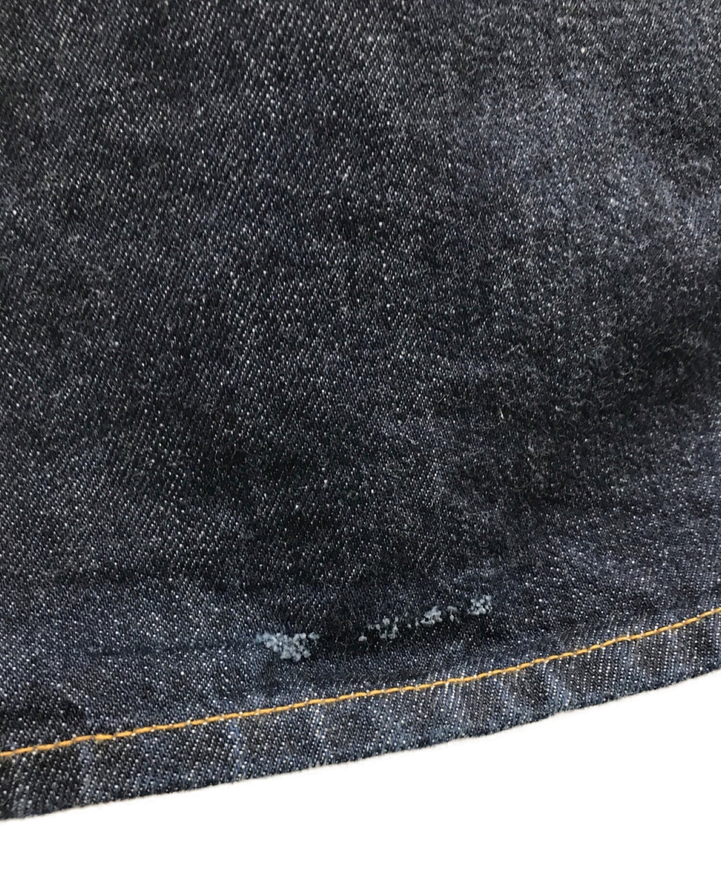 กางเกงยีนส์ Wacko Maria 22Aw ที่มีแพทช์ตาสีดำ