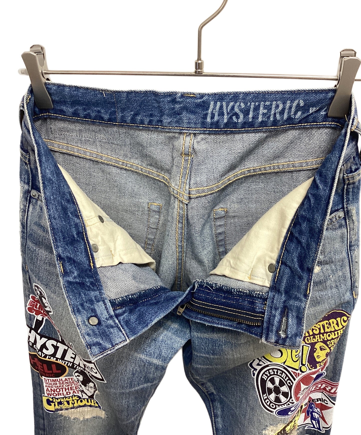 [Pre-owned] Hysteric Glamour Sticker Print Damaged Denim Pants 02211AP15