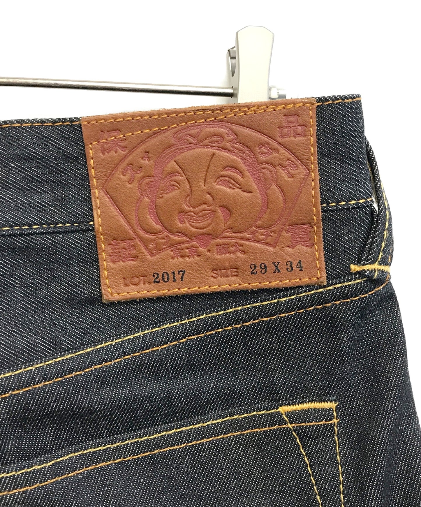 [Pre-owned] EVISU Carrot-fit Denim Jeans with Allover Daruma Daicock Print