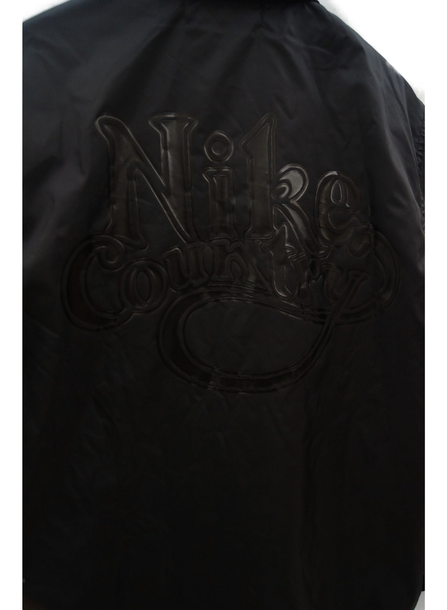 Black Comme des Garcons × Nike Coach Jacket 1E-J101