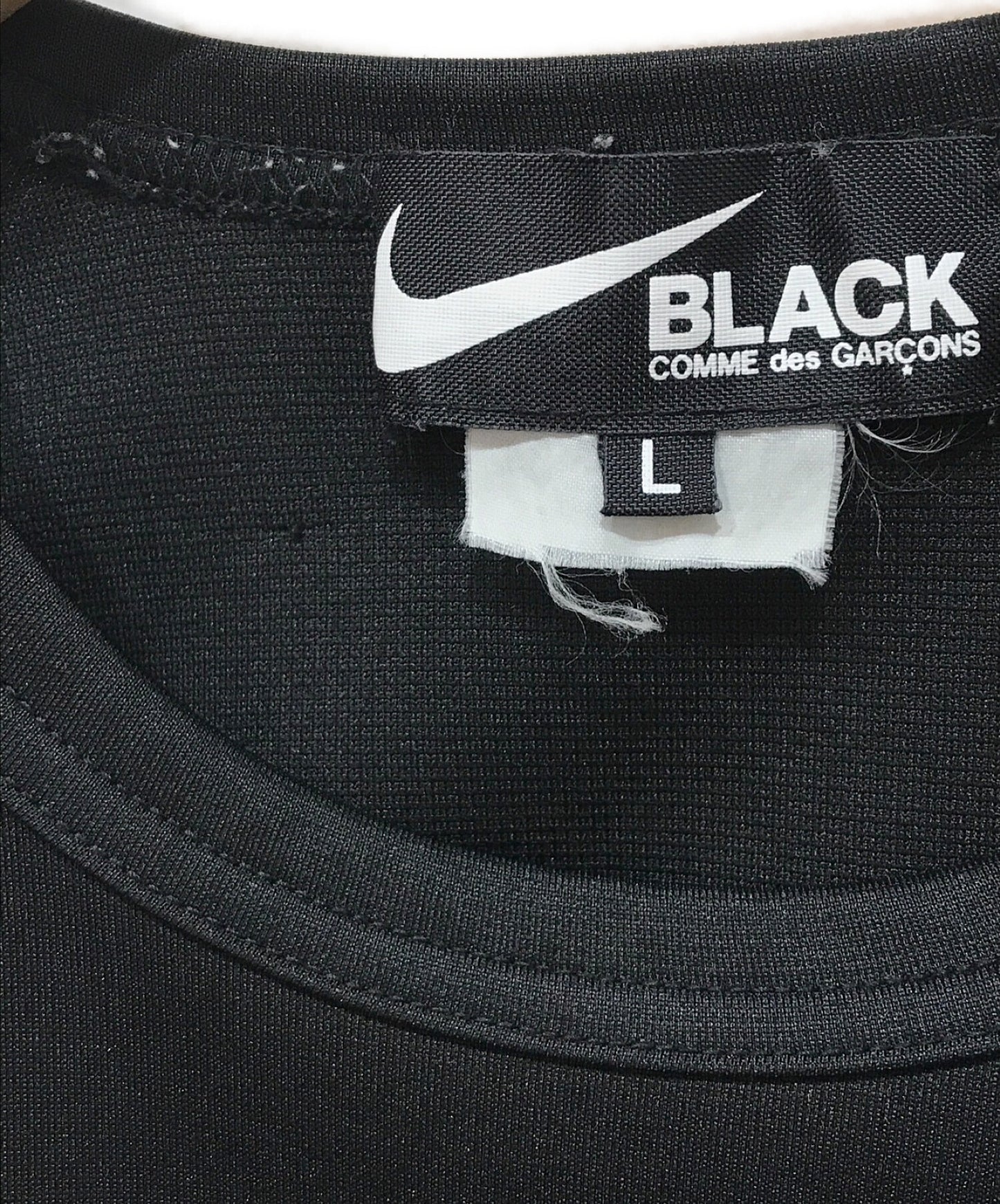 Black Comme des Garcons × Nike พิมพ์เสื้อยืด 1E-T101